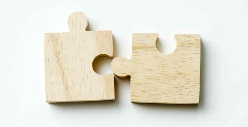 Two pieces of a jigsaw puzzle.