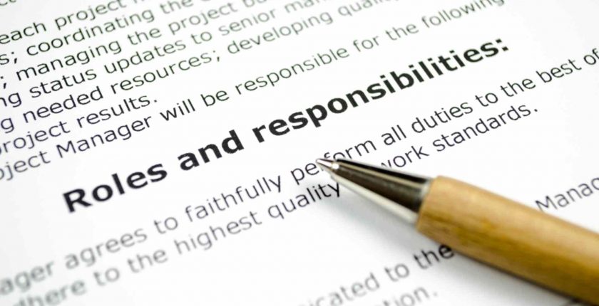 Roles and responsibilities with wooden pen